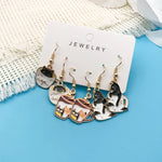 Three-pair cat earring gift set detail
