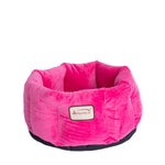 Armarkat Pink velvet cuddle bed with raised rounded sides and a dark base