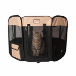 A tabby cat sits inside the Black and Beige Armarkat Medium playpen behind its mesh door