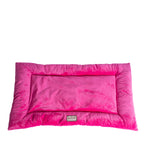 Vibrant Pink Armarkat velvet cat mat with a low padded border