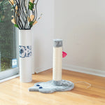 Armarkat Silver Gray mouse scratcher beside a window on a wood floor