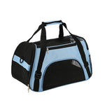 Blue soft-sided cat travel carrier with black mesh panels and carry handles
