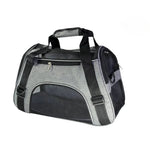 Gray soft-sided cat travel carrier with black mesh panels and carry handles