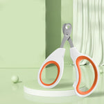 Orange-handled cat nail scissors with circular blade opening