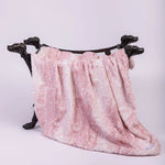 Hello Doggie Cashmere Collection blanket in Pink Fawn, draped to show the patterned fabric
