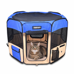 Tabby cat resting inside a blue and beige JESPET soft-sided playpen with mesh sides and an open front door