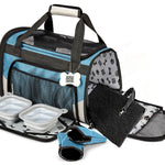 Blue Carrier Plus showing the open entrance, padded interior, bowls, food containers and placemat