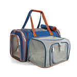Blue Mr. Peanut’s Gold Mini carrier with its mesh expansion open, top privacy cover rolled back and carrying handles