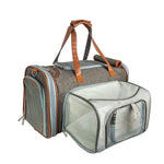 Charcoal Mr. Peanut’s Gold Mini carrier with mesh expansion open, brown handles and light blue trim