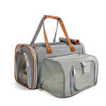 Platinum Gray Mr. Peanut’s Gold Mini pet carrier with brown carrying handles
