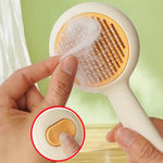Removing collected fur from the self-cleaning cat brush