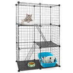 Three-tier black cat playpen with a cat on the upper platform and another in a blue litter tray below