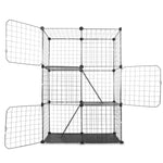 Empty three-tier black cat playpen with access doors open