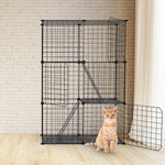 Black indoor cat playpen beside a cat in a room