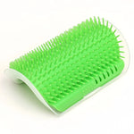Green wall-mounted cat grooming brush